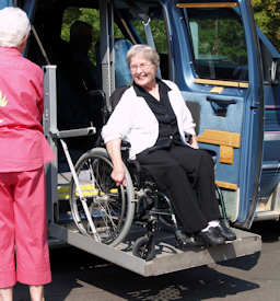 woman on wheelchair lift