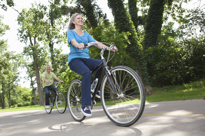 people enjoying active transportation on a regional trail