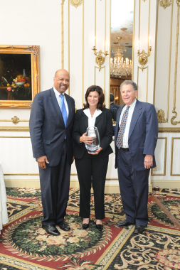 The Honorable Terence Farrell, Chester County Commissioner, presenting to Marian and Dave Moskowitz, Owners, Franklin Commons