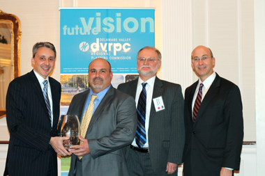 David Kuhn, Assistant Commissioner, Capital Investment Strategies, Planning and Grant Administration, for the New Jersey Department of Transportation and DVRPC Vice Chair, presenting to Gloucester County Engineer, Vince Voltaggio, and former Gloucester County Planning Director, Chuck Romick David Kuhn, Assistant Commissioner, Capital Investment Strategies, Planning and Grant Administration, for the New Jersey Department of Transportation and DVRPC Vice Chair, presenting to Gloucester County Engineer, Vince Voltaggio, and former Gloucester County Planning Director, Chuck Romick