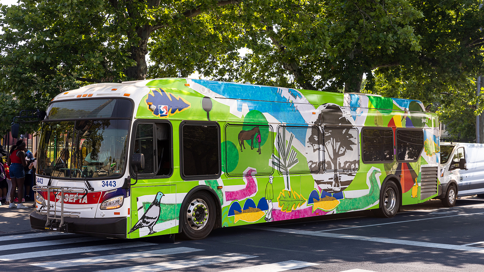 A SEPTA bus wrapped in colorful art